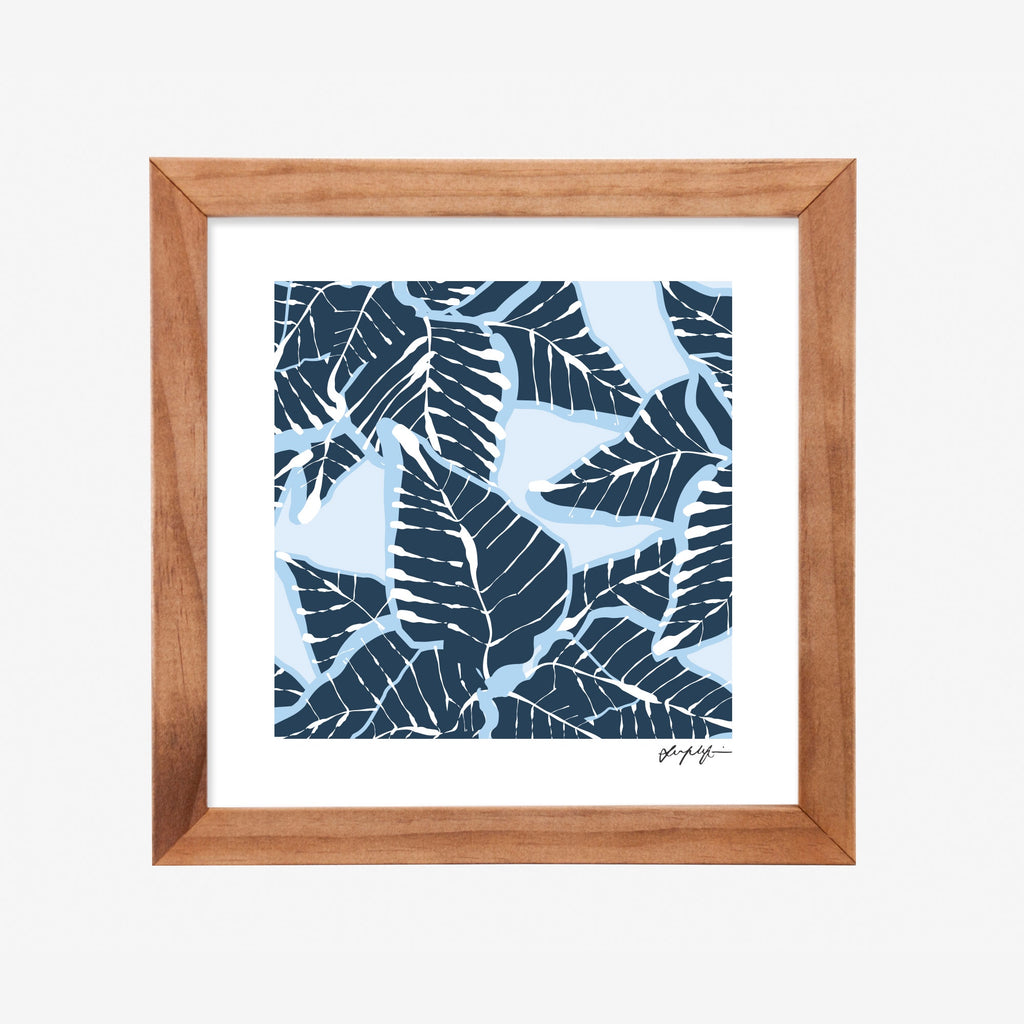 Wooden square framed First Nations art print with blue leaf pattern on a white mount