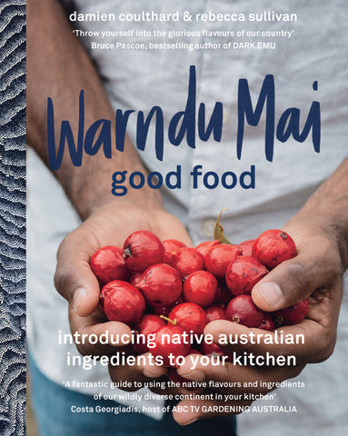 A cover image of the cookbook titled 'Warndu Mai (Good Food)' showing a person holding a bunch of red native Australian produce.