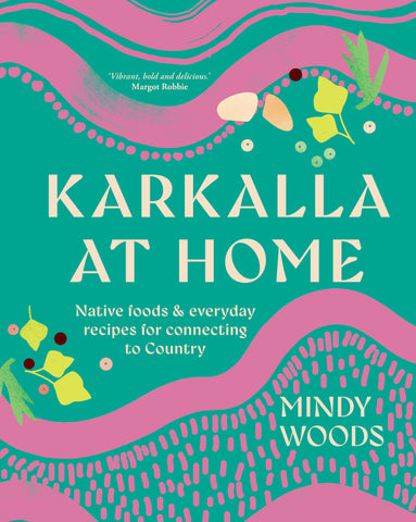 A book cover for 'Karkalla at Home' featuring a vibrant, design in shades of pink and green, with text that includes the title and the author's name, Mindy Woods.