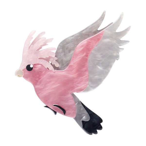Pink and grey resin galah brooch depicted in flight on a white background