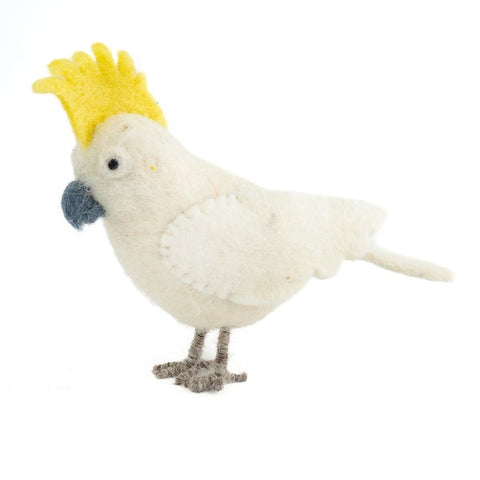 Stuffed toy of a cockatoo with a yellow crest on a white background