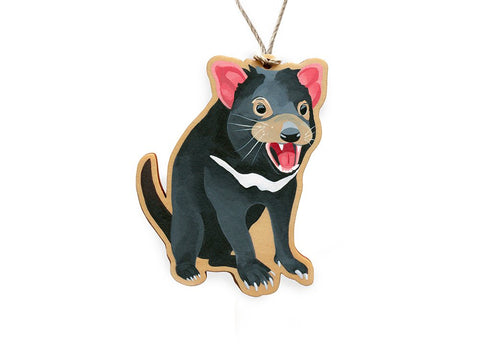 A decorative hoop pine ornament in the shape of a Tasmanian Devil, with an original painting printed on one side, sustainably made in Australia.