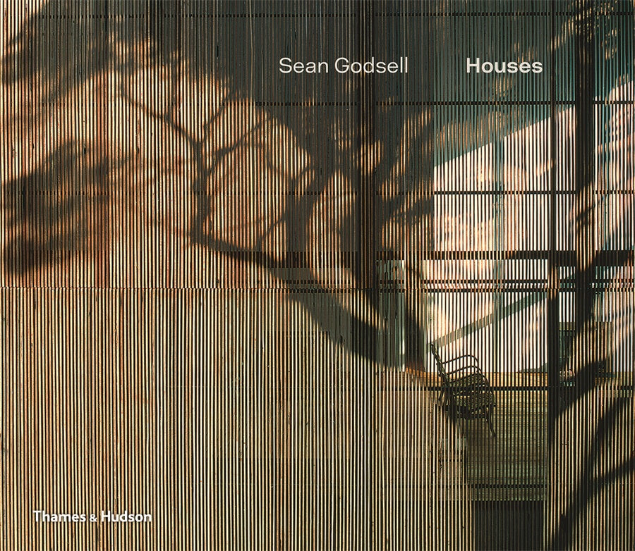 Cover of the book 'Sean Godsell: Houses' featuring a photograph of a house with tree shadows and the title text.