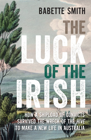 This image features the cover of the book titled "The Luck of the Irish" by Babette Smith. The cover depicts a scenic view of a colonial Australian landscape with a prominent tree on the left and a distant mountain range.