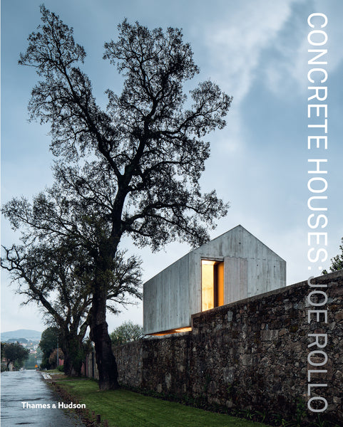 The cover of the book 'Concrete Houses' by Joe Rollo, featuring a photograph of a modern house with concrete elements, partially illuminated, situated next to a wall and trees in the background.