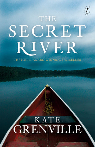 The image features the cover of "The Secret River" by Kate Grenville. The book's cover displays a serene and dramatic scene with a boat floating on calm blue waters, under a grey sky.