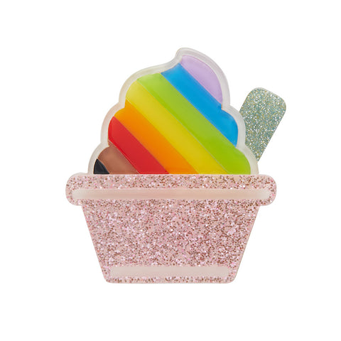 Progressive Pride flag coloured brooch in the shape of an ice-cream in a sparkly pink cup.