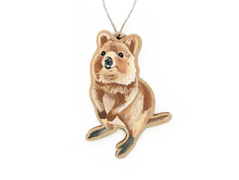 A decorative hoop pine ornament in the shape of a quokka, with an original print of the animal, produced by Outer Island.
