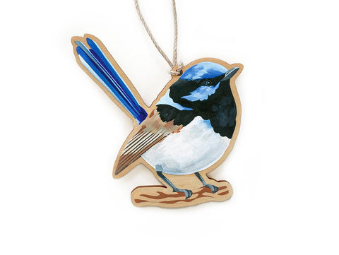 A decorative hoop pine ornament in the shape of a fairy-wren with a blue tail, black and white body, and red-brown legs, against a white background.