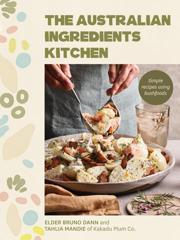 Cover of the book 'The Australian Ingredients Kitchen' featuring a plate of food with native Australian ingredients, with the authors' names below.