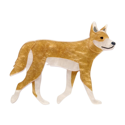 Pale sparkly tan Dingo resin brooch  on a white background