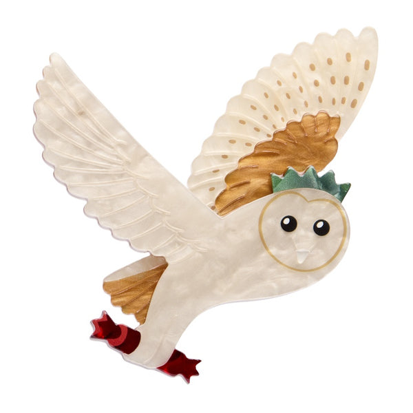 Erstwilder Otto the Owl layered resin brooch features a cream coloured owl in flight wearing a Christmas crown and carrying a red Christmas cracker in their claws. 