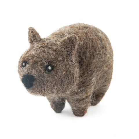 Felted wool wombat toy on a white background
