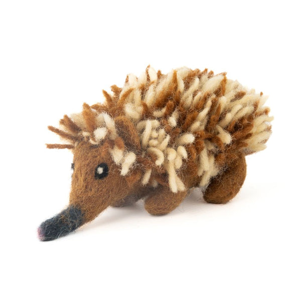 Stuffed felt echidna woollen toy on a white background
