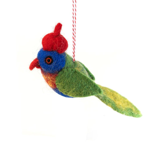 Colorful bird-shaped Christmas ornament with a red hat on a white background