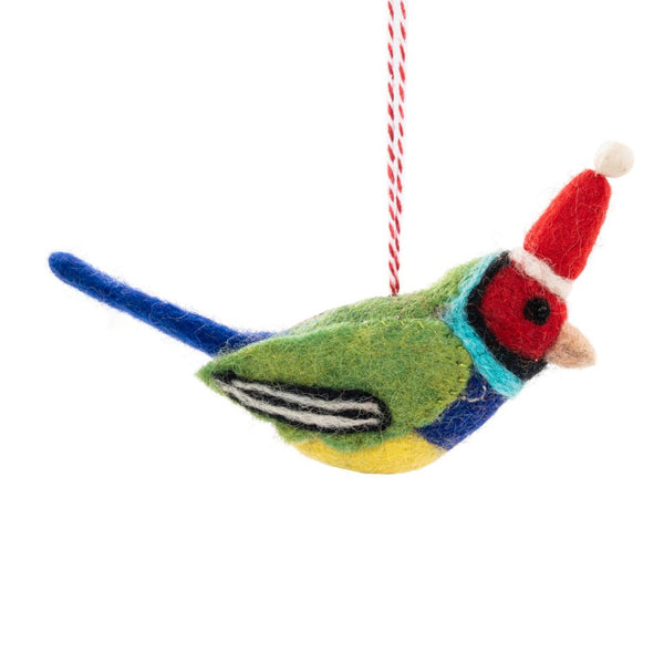 A colourful felt bird ornament wearing a red Santa hat against a plain white background.