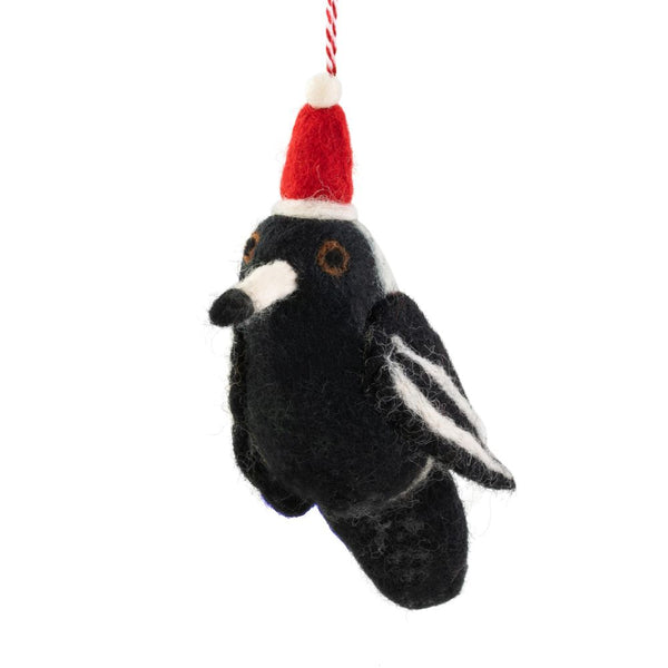 Felt bird ornament with a Santa hat on a white background