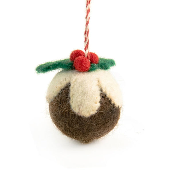 A felt Christmas pudding ornament hanging from a red and white string on a white background.