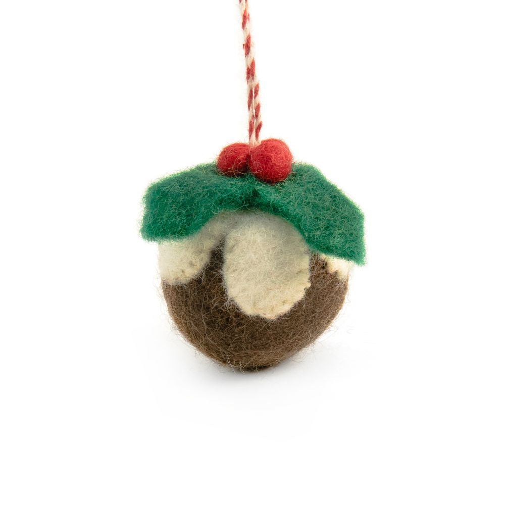 A felt Christmas pudding ornament hanging from a red and white string on a white background.