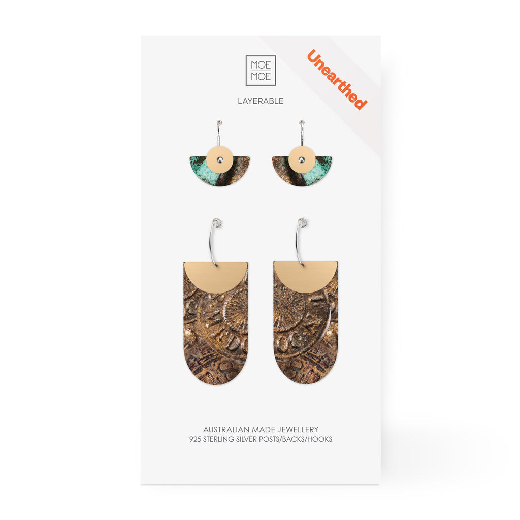 Two pairs of earrings featuring a pattern created from a digital image from the archaeology collection at Museum of Sydney