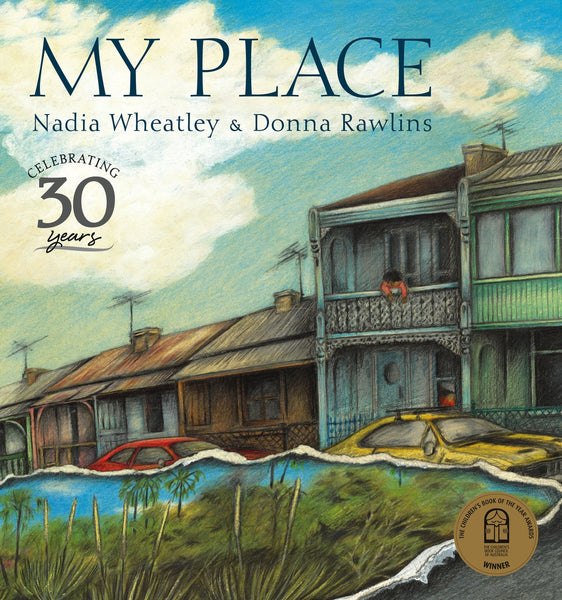 Book cover of 'My Place' by Nadia Wheatley & Donna Rawlins with an illustration of Sydney terrace houses and cars.