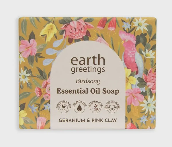 Earth Greetings essential oil soap with floral packaging on a white background