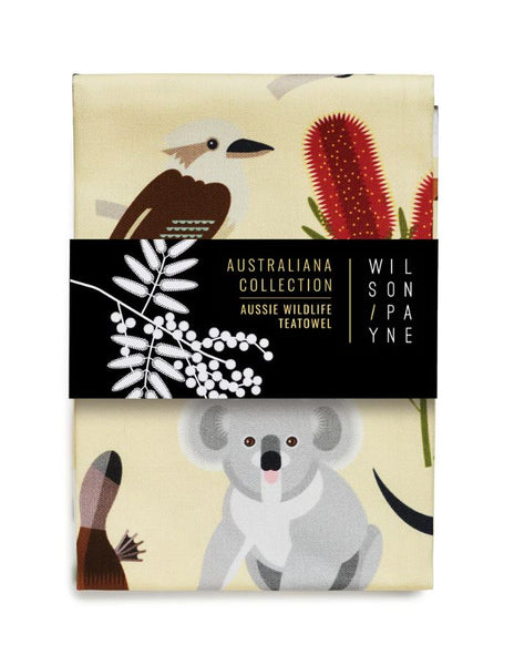 A cotton tea towel with colourful Australian wildlife designs, such as a koala and a kookaburra.