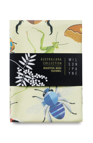 A colorful tea towel with an Australian insect theme, featuring designs such as beetles and butterflies.