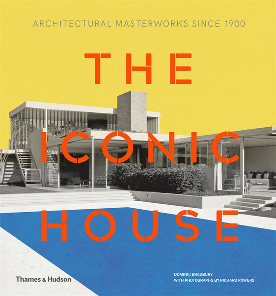 The cover of the book 'The Iconic House' featuring a black and white photograph of a modernist house with a bold yellow and orange title text.