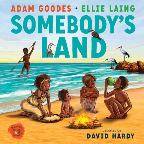 A cover of the children's picture book 'Somebody's Land: Welcome to Our Country' featuring illustrations of children and adults in a beach setting with a sunset in the background. The book is authored by Adam Goodes and Ellie Laing and illustrated by David Hardy.
