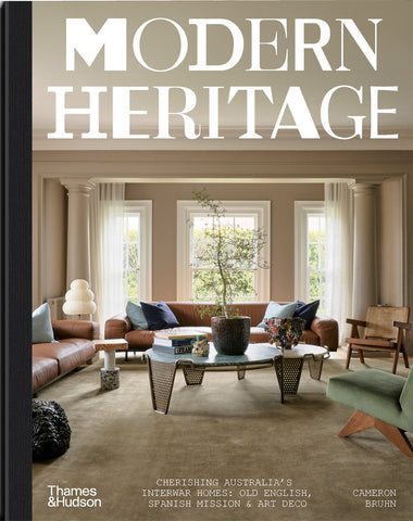 Cover of the book 'Modern Heritage' featuring an interior photograph of a stylishly decorated room with luxurious furniture and large windows.