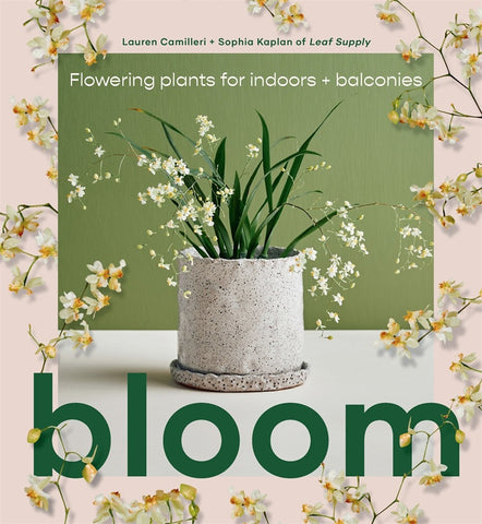 The image presents the cover of a book titled "Bloom," authored by Lauren Camilleri and Sophia Kaplan. The cover features a visually appealing potted plant with white flowers, set against a soft green background.