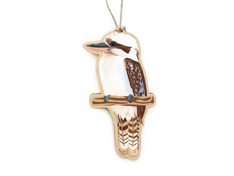 A wooden ornament in the shape of a Kookaburra, a native Australian bird, printed on one side.